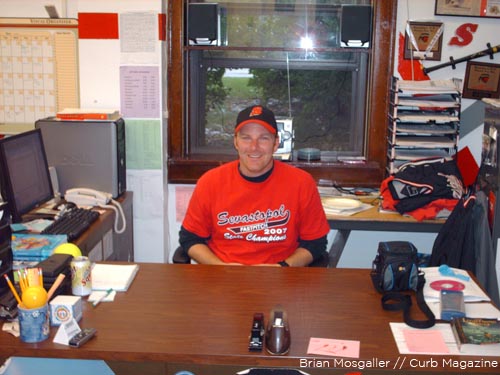 Tim Newton, here sporting his homecoming gear, says having teachers head sports teams is a "perfect fit."